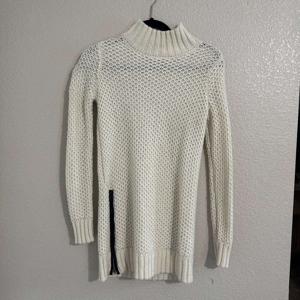 Banana Republic cream knitted sweater with side zipper.